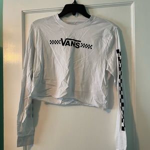 Vans size small white cropped shirt with checker pattern down sleeves. Vans logo